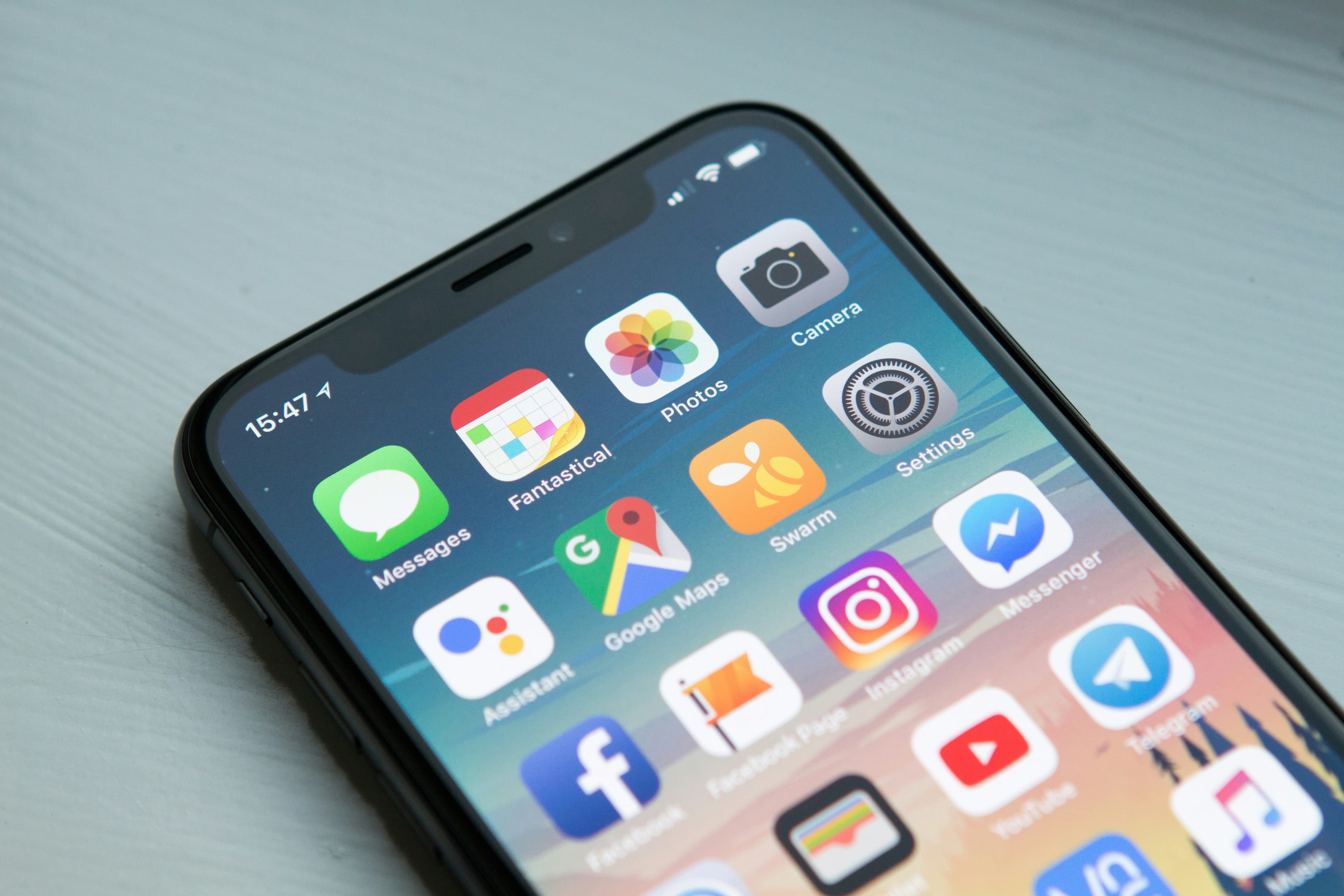 A smartphone home screen showing several app icons
