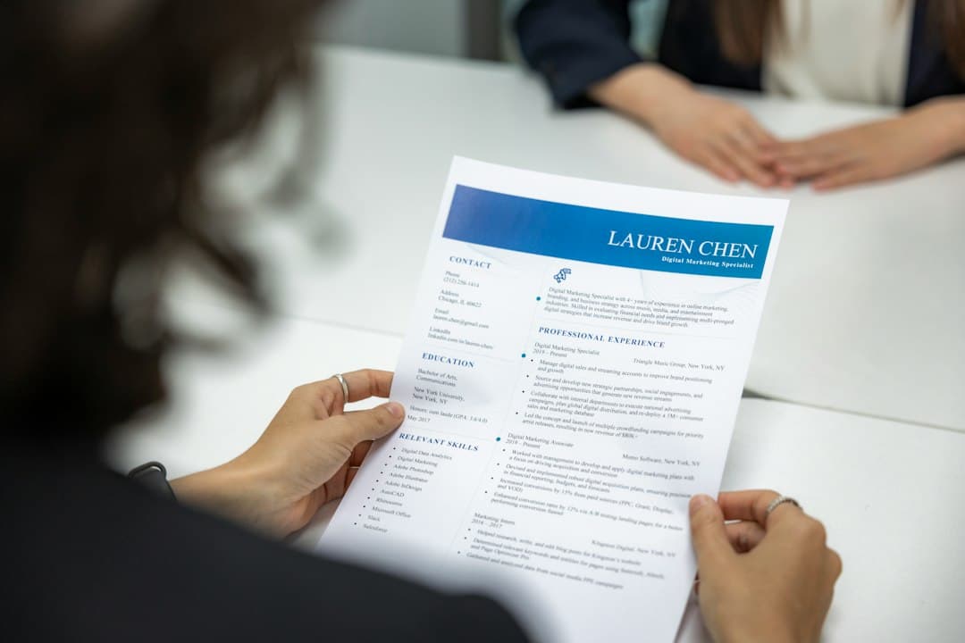 Close-up of a résumé being read during a job interview